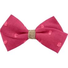 Petite Barrette Double Noeud Croisé plumetis rose fuchsia